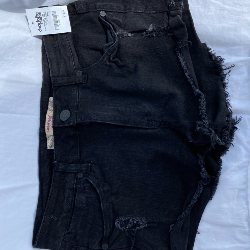 Black distressed jean shorts